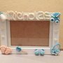 Cornice bimbo con nome e decorazioni in fimo