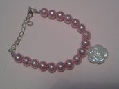 Bracciale di perle con ciondolo con fiocco o rosa 