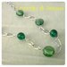 collana catena color argento e perle di vetro verde