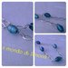 collana lunga a catena color argento e perle di vetro ovali azzurre