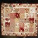quilt trapunta "cuori celtici" con una tecnica patchwork denominata applique tonalità rosa e rosso
