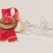 Catenella portaciuccio da cerimonia in raso: l'accessorio elegante per un bebè vestito a festa