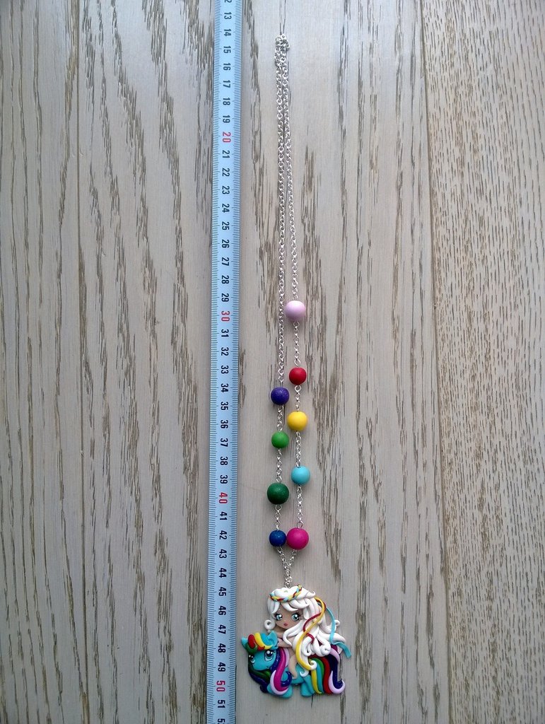 Pavone, gioiello pavone, collana piuma, ciondolo con piuma, gioiello
