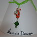 collana verde con kokeshi memole design