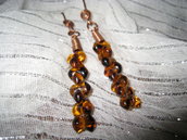 Copper earrings with amber pearls