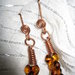 Copper earrings with amber pearls