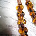 Copper earrings with amber pearls