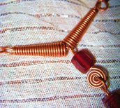 Copper necklace with red cubes