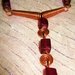 Copper necklace with red cubes