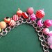 Bracciale charms perle di  plastica arcobaleno