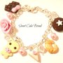 BRACCIALE FIMO PAN DI STELLE CIONDOLI CHARMS OMINO TORTA CORNETTO ROSA