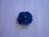 Yo-yo circolare (diametro 6 cm) di stoffa color azzurro