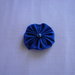 Yo-yo circolare (diametro 6 cm) di stoffa color azzurro