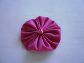 Yo-yo circolare (diametro 6 cm) di stoffa color fucsia