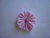 Yo-yo circolare (diametro 6 cm) di stoffa color rosa chiaro