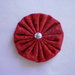 Yo-yo circolare (diametro 6 cm) di stoffa color rosso