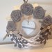 Corona in legno con rose di lino grigie e cuore di legno