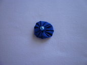 Yo-yo circolare (diametro 3 cm) di stoffa color azzurro