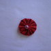 Yo-yo circolare (diametro 3 cm) di stoffa color rosso