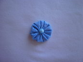 Yo-yo circolare (diametro 3 cm) di stoffa color celeste