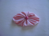 Yo-yo ovale di stoffa color rosa chiaro