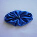 Yo-yo ovale di stoffa color azzurro lucido