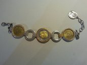 Bracciale con monete in lire incastonate color oro