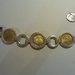 Bracciale con monete in lire incastonate color oro