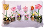 Primavera con fiori di tessuto in vaso