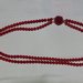 collana lunga perle rosse due fili  con centrale Rosa rossa