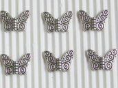  6 charms farfalline lavorate 15x10mm