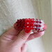 Bracciale cuoio rosso e cristalli swarovski 4 mm. intrecciati a sfumare