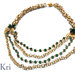 Piccole perle verdi  in una collana con multifili dorata