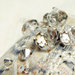 Braccialetto bangle con applicazioni all'uncinetto e cristalli Swarovski
