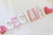 CECILIA: targa nascita con nome scritto in lettere di stoffa bianca e rosa