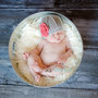 Cappello neonata primaverile realizzato all'uncinetto,in cotone con fiore appliacato