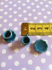 Miniatura tazzina e piattino in ceramica blu