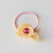 Codini per capelli con fiorellini in feltro rosa: per bambine romantiche ed eleganti!