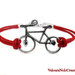 bracciale con bicicletta in argento tibetano cordino rosso 