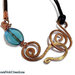 Collana con spirale celtica in rame e perla in vetro azzurro 