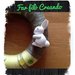 Ghirlanda-coroncina primaverile in lana colorata  ed applicazioni in feltro, bottoni e gesso ceramico