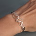 Bracciale "Medusa basic" in argento battuto e filo tubolare elasticizzato
