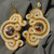 Orecchini pendenti tecnica soutache, fatti a mano, giallo sole e bianco con swarovsky centrale