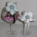 Coppia cerchietti raso con fiore a 5 petali, colori bianco e azzurro