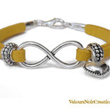 Bracciale simbolo infinito e cuore con distanziatori laccio giallo senape