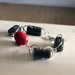 B53.14 - Bracciale in argento con bottoni grigi vintage e perle rosse