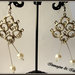 Orecchini chandelier in metallo e perle color avorio