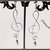 Orecchini "Chiave di violino" con perle Swarovski e alluminio