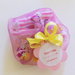 Confezione regalo personalizzata per ghirlanda di lettere di stoffa rosa e gialla