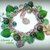 Bracciale con charms quadrifoglio e coccinella portafortuna, perle e cuori verdi